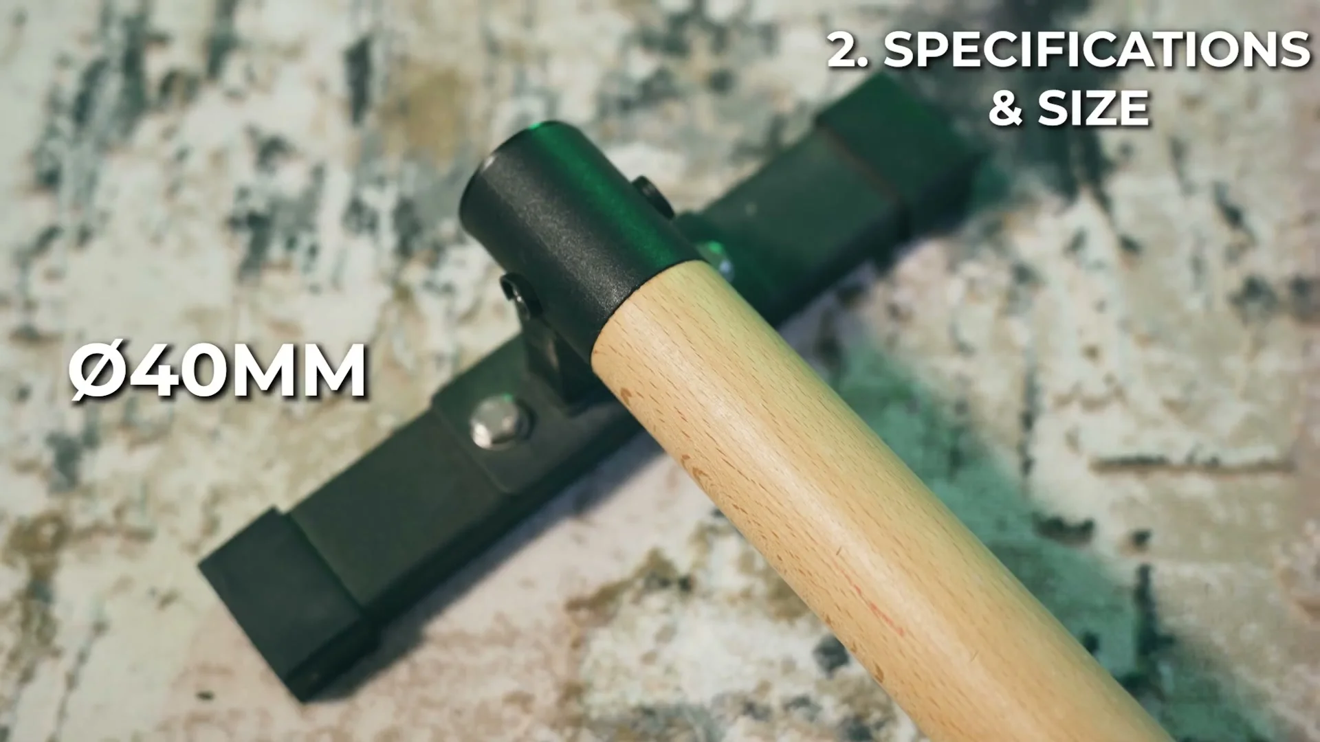 Close-up of the metal parallette grip meeting the wooden parallette grip, both measuring 40 millimeters in diameter