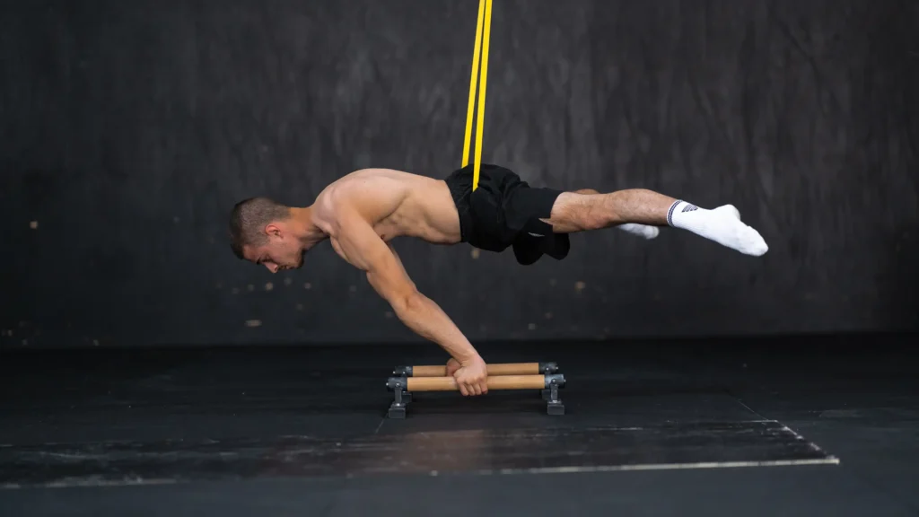 Straddle Planche With Resistance Band by Daniel Hristov