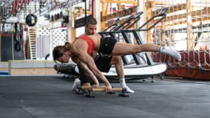 Assisted Straddle Planche with the help of calisthenics coach Daniel Hristov
